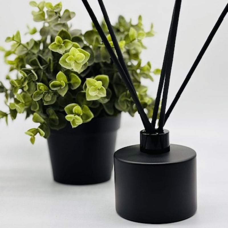 Make your own scented reed diffuser with our Matte Black Cylinder Diffuser Bottle