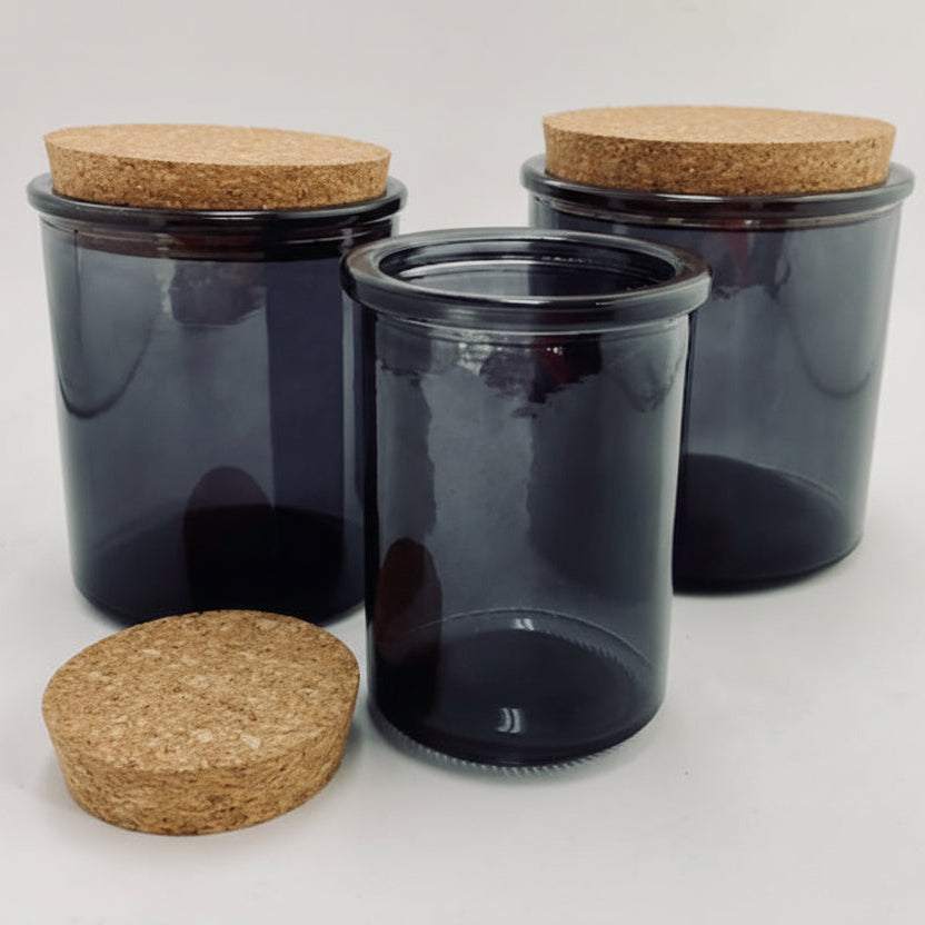 Apothecary candle jar with cork lid  It is quite reminiscent of the aged old vintage style.