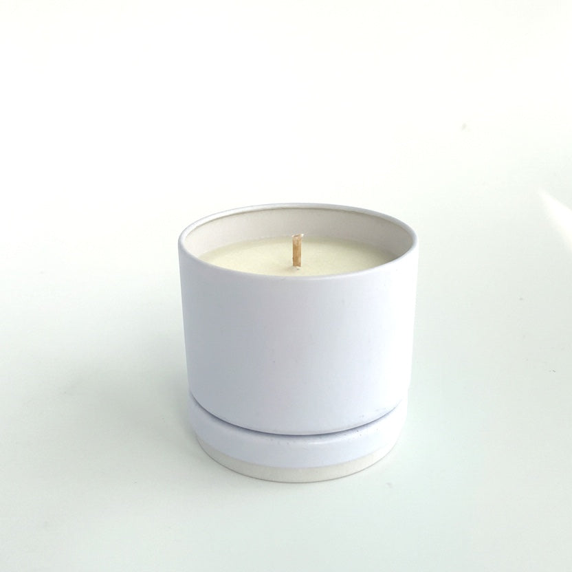 White candle on a white background